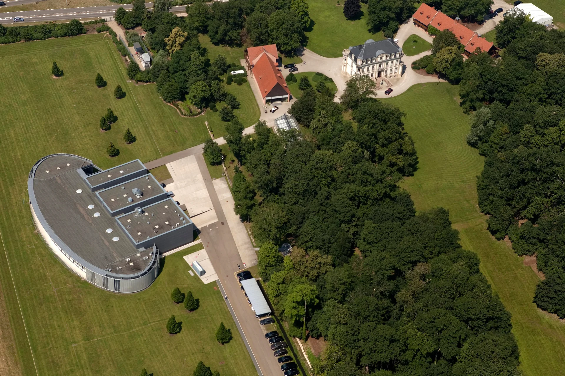 Aerial photograph of Bugatti at Chateau Saint Jean, Molsheim, France, showing the chateau and atelier in 2019.