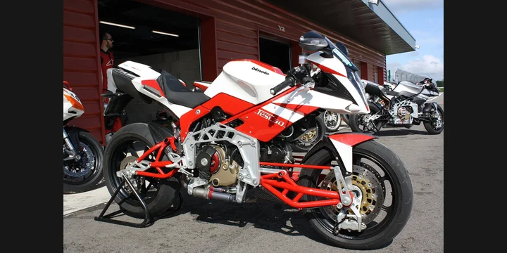 2007 Bimota Tesi. Photograph by Dédélembrouille, CC BY-SA 3.0. https://commons.wikimedia.org/wiki/File:Bimota Tesi 3D factory.jpg Fit to 2:1 with dark side borders.