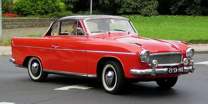 1959 Hansa 1100. Photograph by Lothar Spurzem, CC BY-SA 2.0 DE. https://commons.wikimedia.org/wiki/File:Hansa_1100_Coupé_(2005-08-27).JPG Fit to 2:1 with dark side borders.