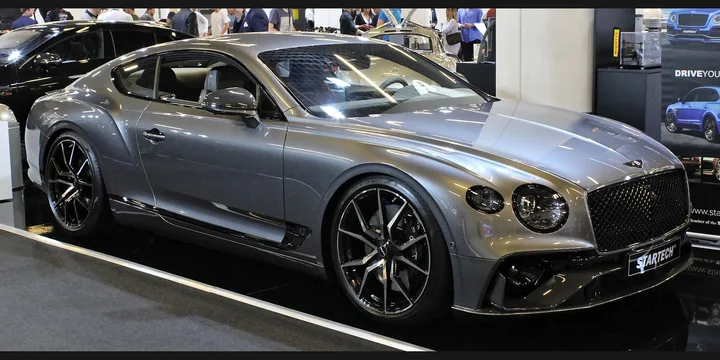2018 STARTECH Continental GT. Photograph by Alexander Migl, CC BY-SA 4.0. https://commons.wikimedia.org/wiki/File:Startech_Bentley_Continental_GT_Top_Marques_2019_IMG_1122.jpg Fit to 2:1 with dark side borders.