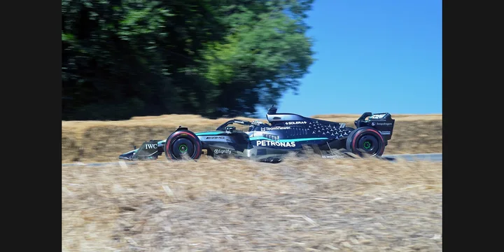 2025 Mercedes-AMG F1 W16 E Performance. Photograph by Neil, CC BY 4.0. https://commons.wikimedia.org/wiki/File:Mercedes-AMG_F1_W16_E_Performance_(55060466583).jpg Fit to 2:1 with dark side borders.